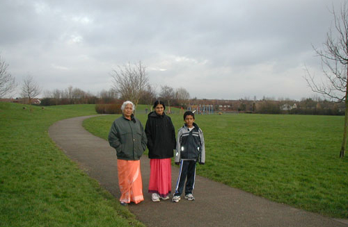 Ravi outdoors with family.